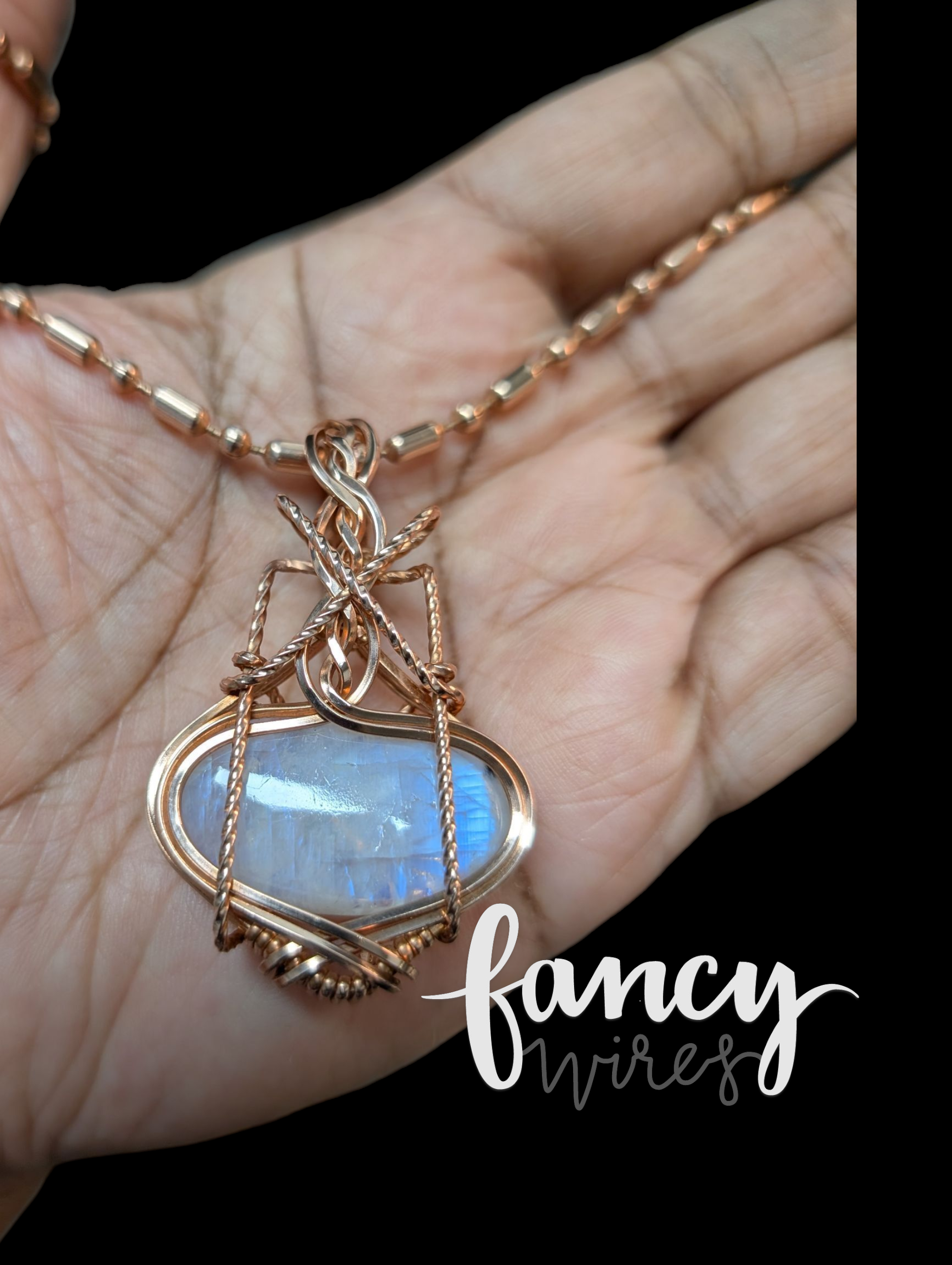 Fancy Wrapped Rainbow Moonstone Pendant