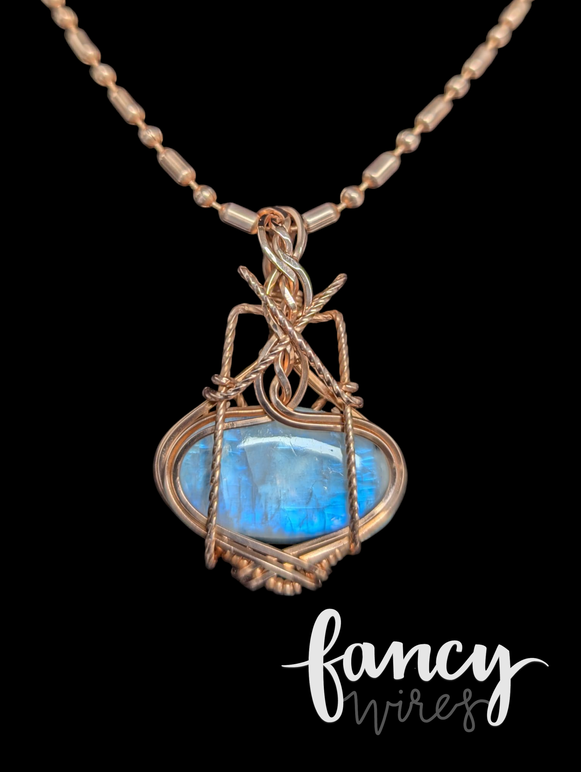 Fancy Wrapped Rainbow Moonstone Pendant