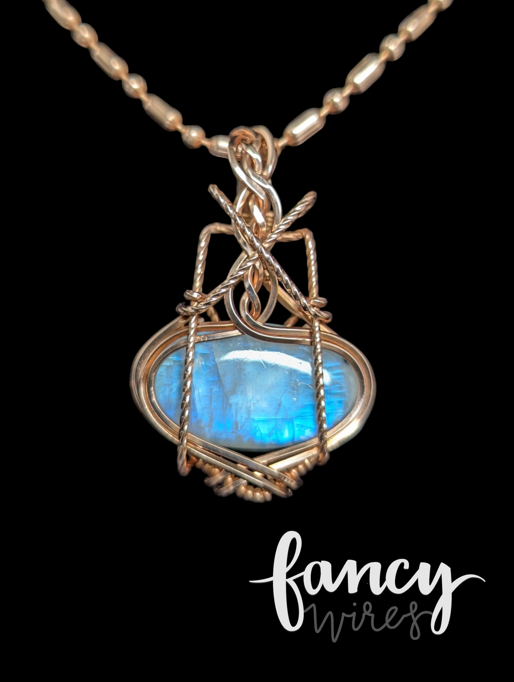 Fancy Wrapped Rainbow Moonstone Pendant