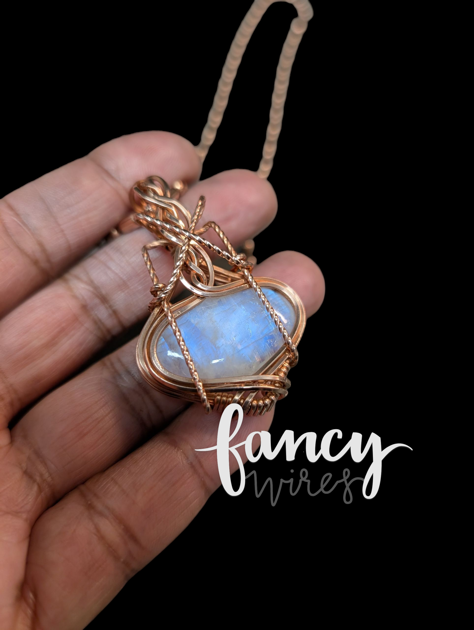 Fancy Wrapped Rainbow Moonstone Pendant