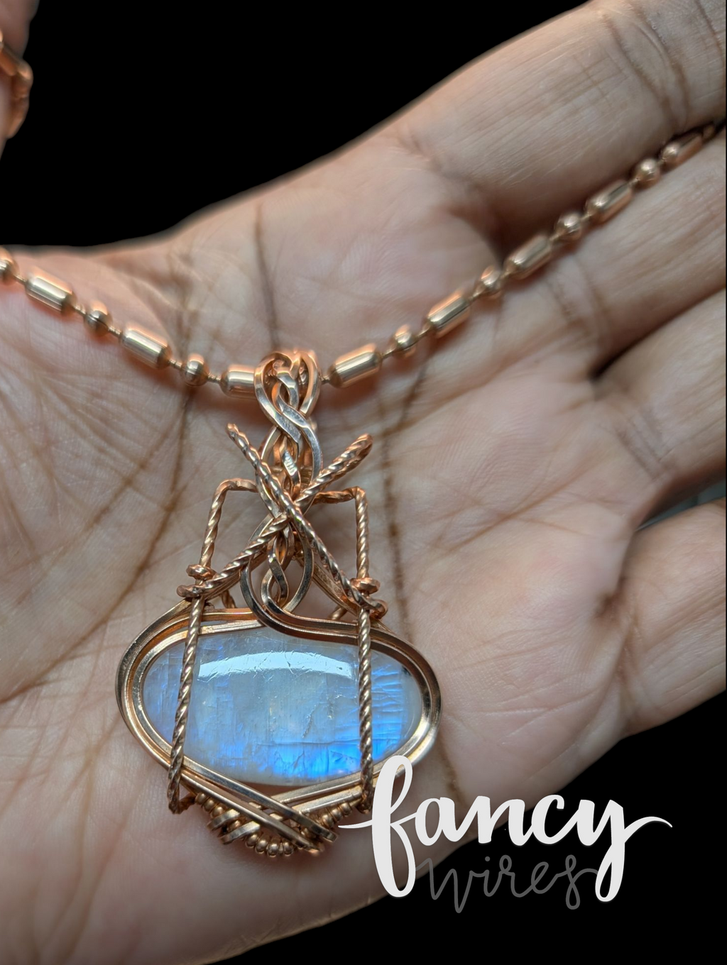 Fancy Wrapped Rainbow Moonstone Pendant